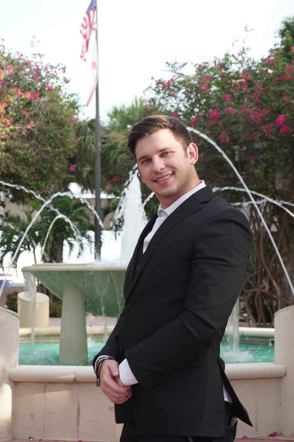 Simas Bandzevicius outdoors in Tampa in a dark suit