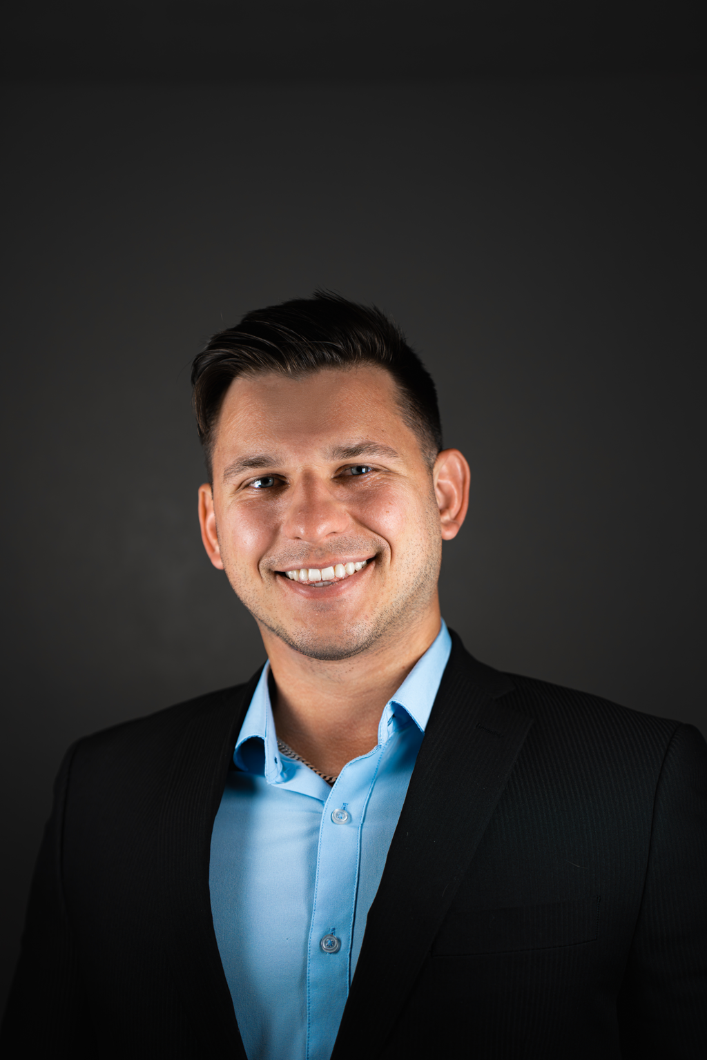 Professional headshot of Simas Bandzevicius, Business Analyst and AI Automation specialist